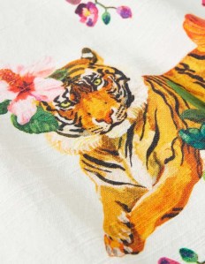 Artistic detail on kitchen tea towels.